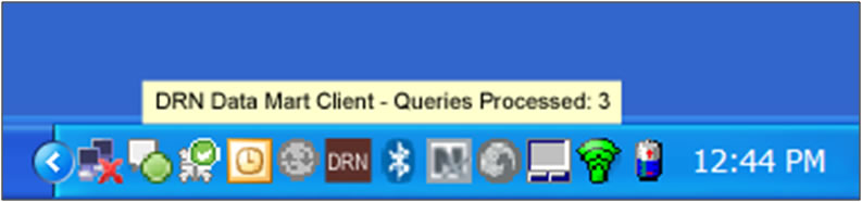 This screen shot shows the Data Mart Client tray icon. Messages appear when the Client receives and processes queries while set in unattended mode.